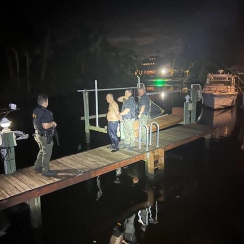 Hit and run driver attempts to avoid capture by hiding under boat dock - photo licensed by shore news network.