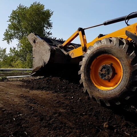 Vineland man goes on rampage with backhoe, flipping police car before being shot and killed - photo licensed by shore news network.