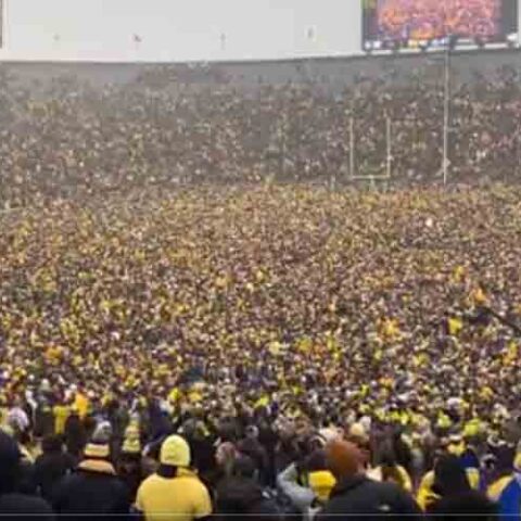 100,000 michigan fans sing mr. Brightside after beating ohio state for big 10 title - photo licensed by shore news network.