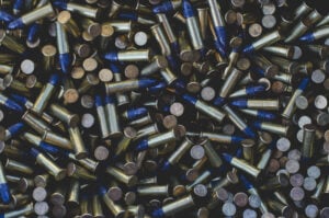 New york man charged for being a convicted felon in possession of a firearm and ammunition