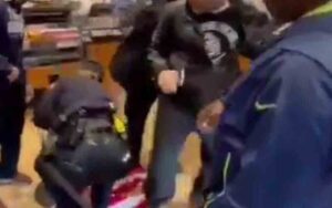 New york police officers throw american flag on the ground, arrest unvaccinated man after trying to order food at panera bread