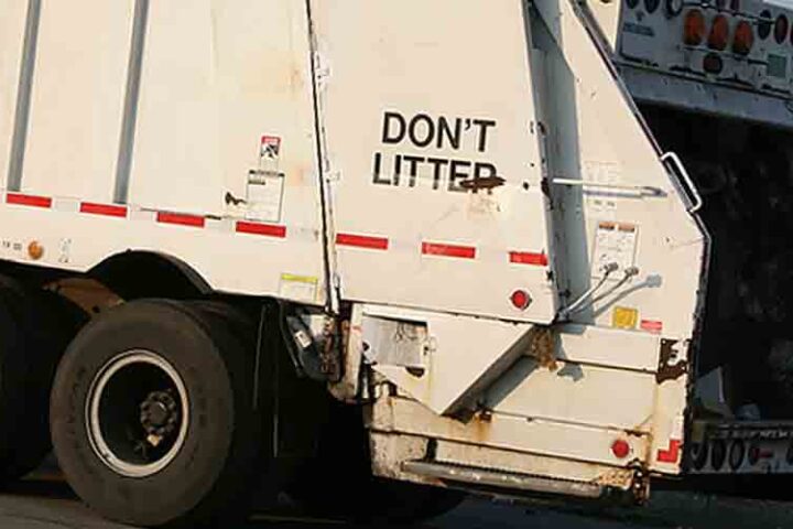A garbage truck during its collection route - File Photo