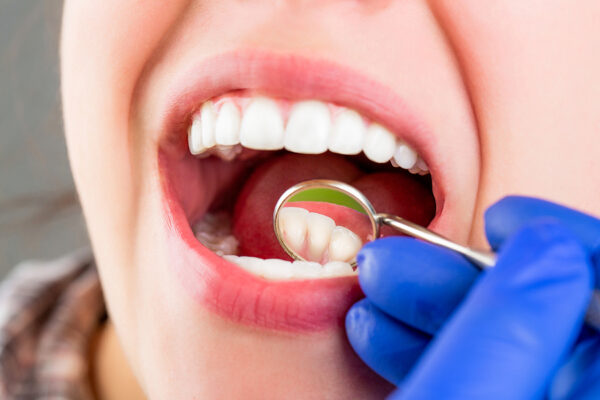 Dentist pleads guilty to assault for groping patient during treatment