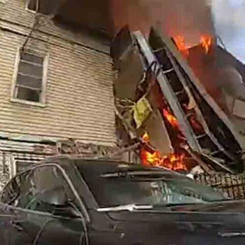 Watch: new york police officers rescue woman trapped under debris in bronx home explosion - photo licensed by shore news network.
