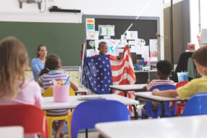 School district banned political symbols, but wealthy progressives, schools are ignoring their policies