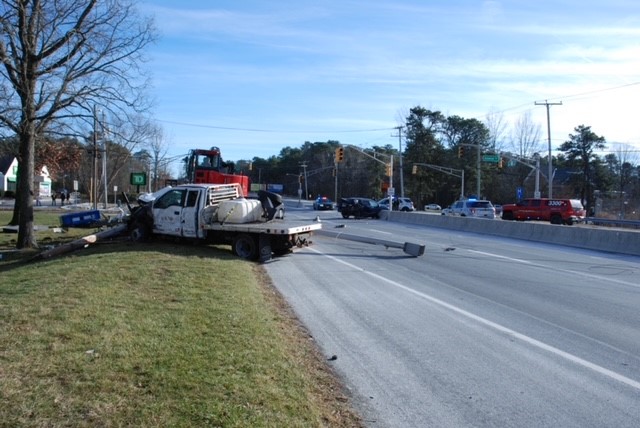 Commercial truck hauler collides with Honda Pilot on Route 37 in Manchester