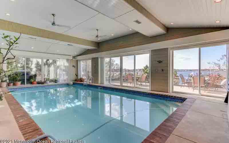 This $3.1 million waterfront home for sale in Toms River even has an indoor pool