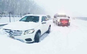 Suffolk county police asking residents to stay off the roads as blizzard conditions continue