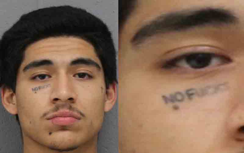 Murder suspect with "No F---ks" tattoo identified by police