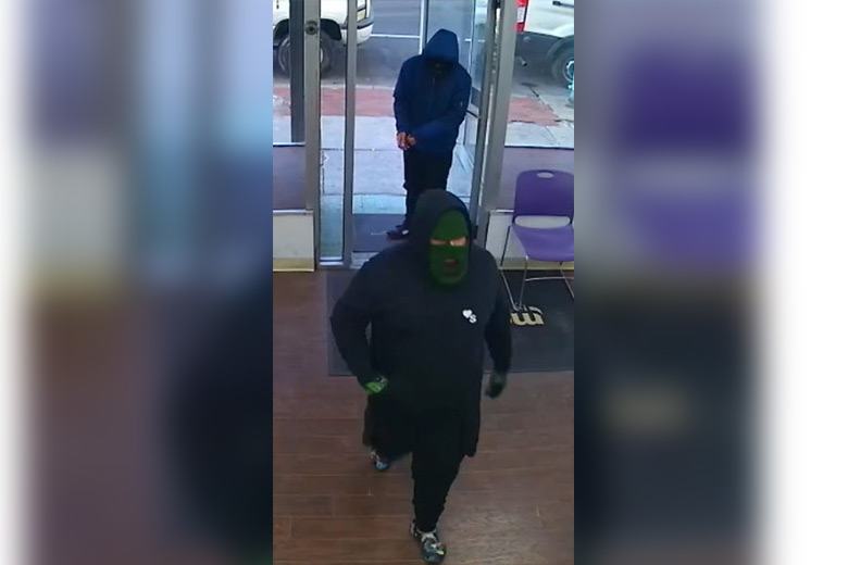 Police release camera footage of Metro PCS armed robbers