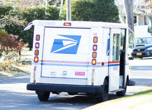 Senate democrats urge postal service to embrace costly electric vehicles