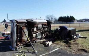 Driver makes an error, causing overturn crash in softball parking lot