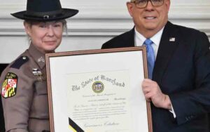 Governor hogan presents governor's citation to hero crossing guard who saved child in viral video