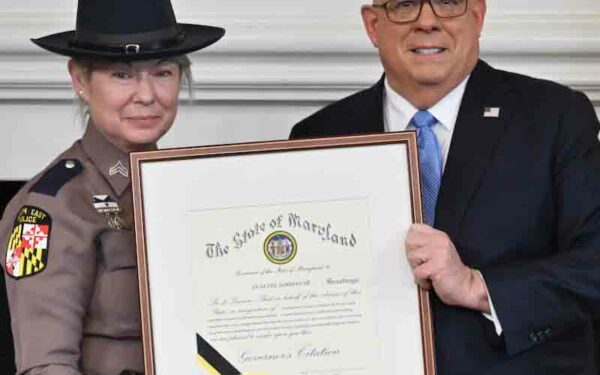 Governor Hogan presents Governor's Citation to hero crossing guard who saved child in viral video