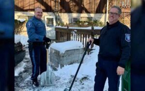 Howell police help meals on wheels dig out senior for a successful dinner delivery