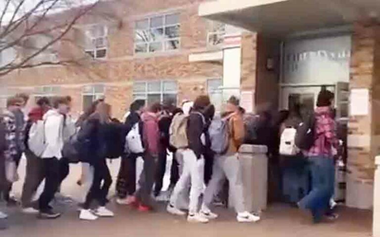 Students in chicago walkout after mask ultimatum from school principal - photo licensed by shore news network.