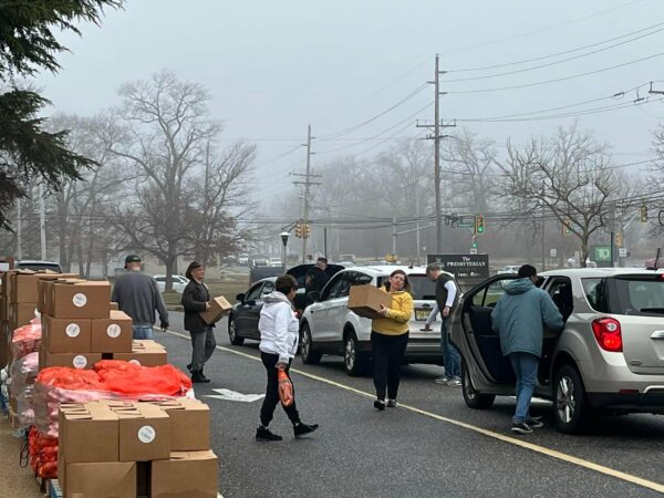Turnbach, Maruca continue community giving in post-public life with food distribution for those in need