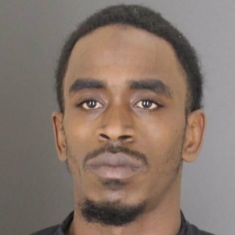 Baltimore police arrest homicide suspect - photo licensed by shore news network.