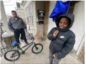 Newark police officer buys new bike for child after his was damaged during hit and run crash