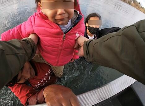 Del Rio Border Patrol agents rescued a family of four, stranded in the Rio Grande River.