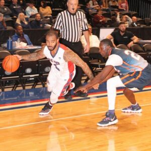 Suffolk county police basketball team defeats nassau county in charity game at coliseum - photo licensed by shore news network.