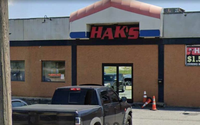 Man sleeping in car shot outside new castle sports bar - photo licensed by shore news network.