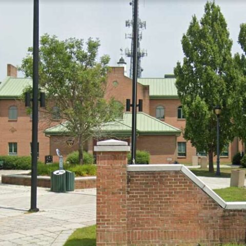 Woman who showed up drunk at police headquarters for child custody exchange - photo licensed by shore news network.