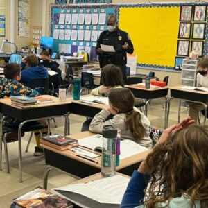 Wall police officer l. E. A. D. S old mill 5th graders to make the right choices - photo licensed by shore news network.