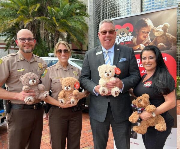 Miami-Dade Police Receive 100 Teddy Bears for Abused, Neglected Children Miami-Dade Police Receive 100 Teddy Bears for Abused, Neglected Children