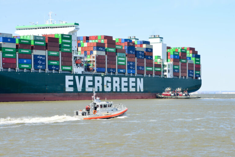 Evergreen cargo ship stuck in the chesapeake bay to be unloaded after refloat attempts failed - photo licensed by shore news network.