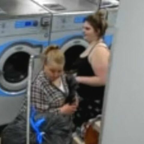 Women steal another's laundry at laundromat - photo licensed by shore news network.