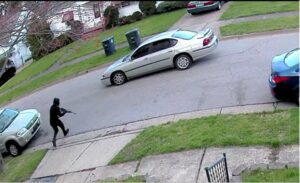 Driveby shooting turns into gunfight that left woman dead