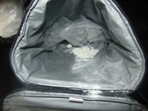 Traffic sop leads to nearly two pound cocaine haul but driver escaped