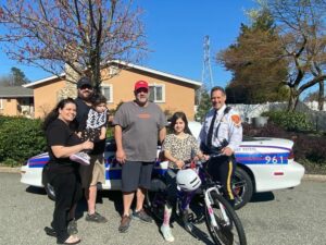 Suffolk county police, bikes for america gives bike to sister of near-fatal drowning victim