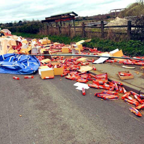 Truck load of english biscuits strewn across road - photo licensed by shore news network.