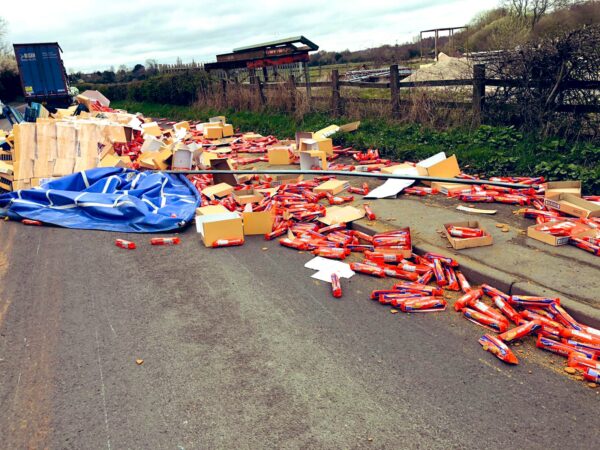 Truck Load of English Biscuits Strewn Across Road