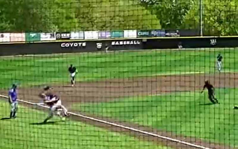College pitcher tackled player after hitting go-ahead home run - photo licensed by shore news network.