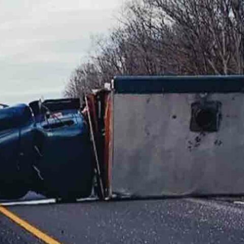 Police searching for suspect who fled scene after crashing into big green truck pizza truck - photo licensed by shore news network.