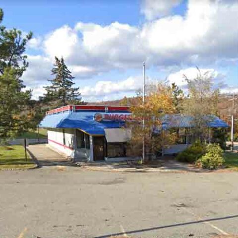 Oakland cop witnessed assault by drunk driver in old burger king parking lot - photo licensed by shore news network.