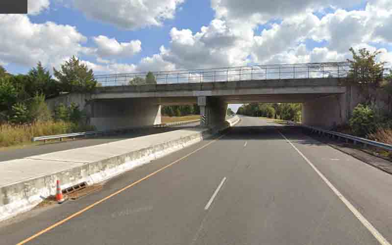 Mack Truck With Elevated Boom Slams Into Overpass on A.C. Expressway