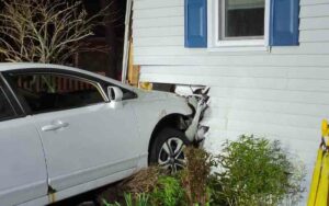 Teen crashed car into home, fled scene
