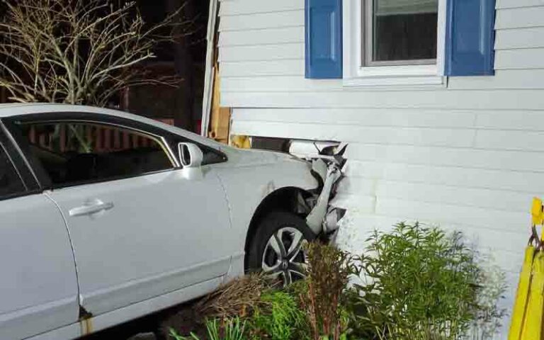 Teen crashed car into home, fled scene - photo licensed by shore news network.