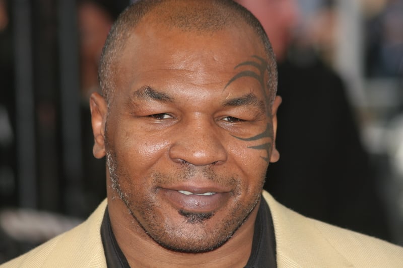 Man Provokes Mike Tyson on Plane, Gets Beat