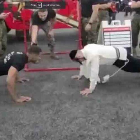 Yeshiva student beats u. S. Marine in gym pushup challenge - photo licensed by shore news network.