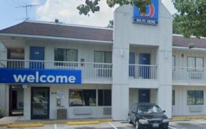 Woman robbed at gunpoint after being forced into motel bathroom