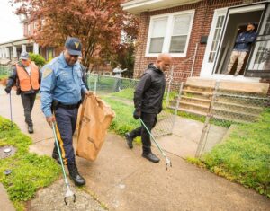 State troopers roll up their sleeves to clean up camden park and neighborhood State troopers roll up their sleeves to clean up camden park and neighborhood