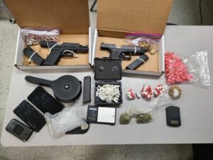 Guns, crack, cocaine and heroin seized during raid in cumberland