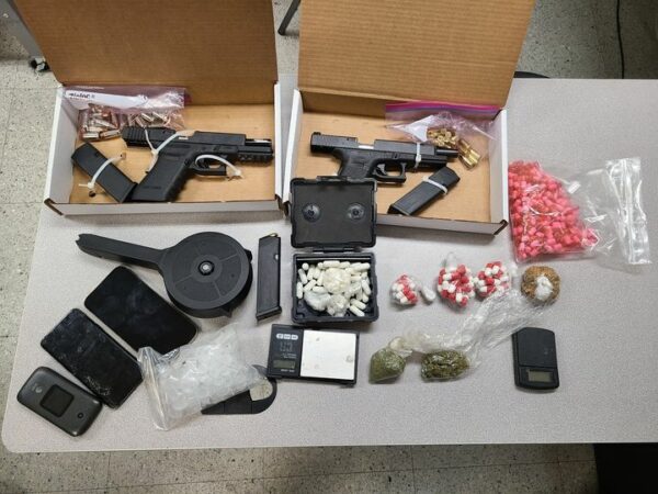 Guns, crack, cocaine and heroin seized during raid in cumberland - photo licensed by shore news network.