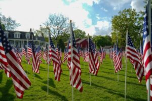 Community comes together to create 'field of honor' for america's veterans, victims