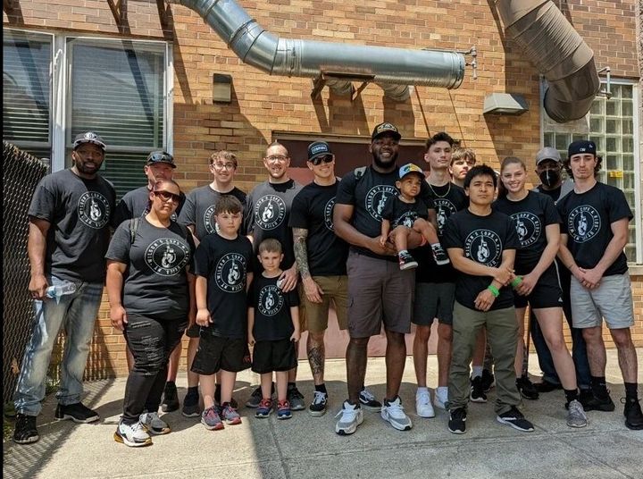 Utica Police Officers Accompany Local Kickboxing Kids to Junior Olympic Event
